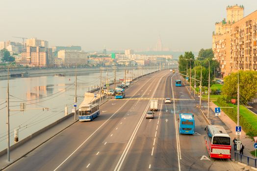 Moscow cityscape - view of the river and the road in the early morning