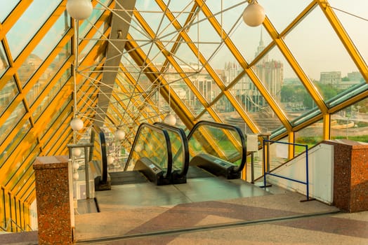 Architecture inside - escalator on the bridge