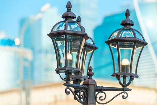 vintage metal lantern in the city close up