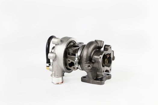 Car turbocharger on an isolated studio white background