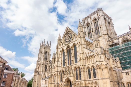 York minster Cathedral with cloudy blue sky, York, England UK.