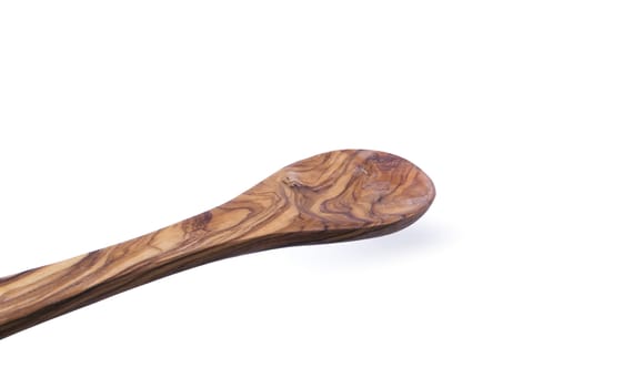 Wooden spoon, close-up isolated on a white background