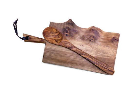 Cutting the old wooden board with a wooden spoon. On a white background. Isolated, close-up.