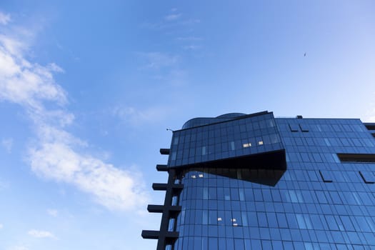 Beautiful skyscraper with architecture and glass window exterior of building around business area in the city. Closeup