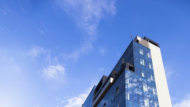 Beautiful skyscraper with architecture and glass window exterior of building around business area in the city. Closeup