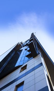 Beautiful skyscraper with architecture and glass window exterior of building around business area in the city. Closeup