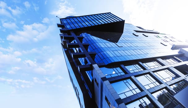 Beautiful skyscraper with architecture and glass window exterior of building around business area in the city. Closeup