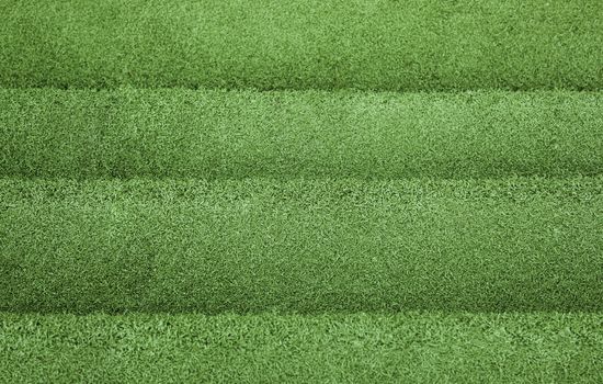 Green artificial grass texture background