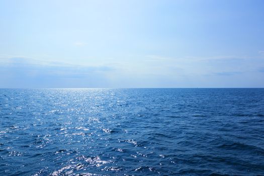 Sea, horizon, blue sky