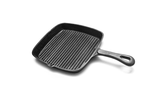 Cast empty grill pan. Isolated on white background