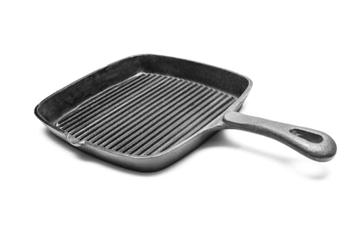 Cast empty grill pan. Isolated on white background
