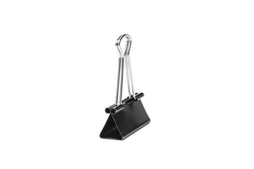 Paper clip isolated from white background. A paperclip is a device for office use to clamp a device such as paper and more.