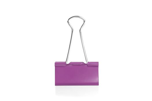 Paper clip isolated from white background. A paperclip is a device for office use to clamp a device such as paper and more.