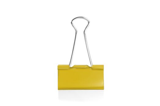 Paper clip isolated from white background. A paperclip is a device for office use to clamp a device such as paper and more.