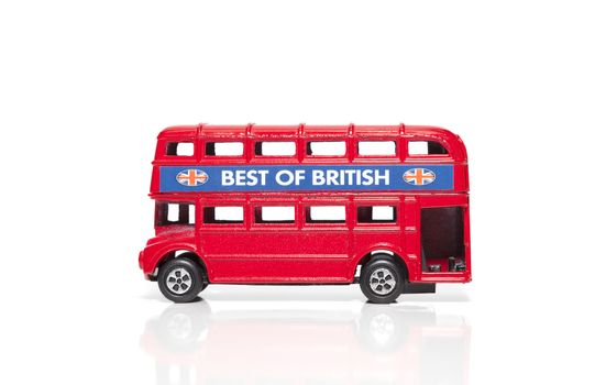 CHISINAU, MOLDOVA - May 01, 2018: Red Double-decker bus miniature toy. London traditional souvenirs and popular city symbols. Isolated on white background