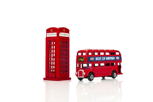 London souvenirs, red telephone booth, double-decker buses popular city symbols. Isolated on white background