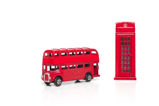 London souvenirs, red telephone booth, double-decker buses popular city symbols. Isolated on white background