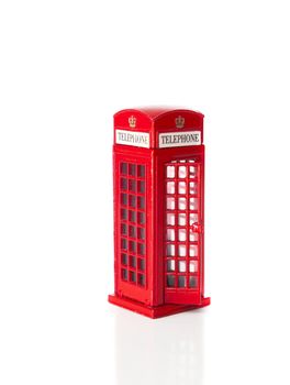 CHISINAU, MOLDOVA - May 03, 2018: London souvenirs, red telephone booth popular city symbol. Isolated on white background