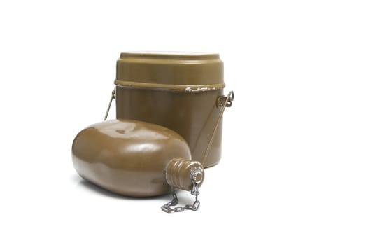 Old military flask on white background. Army water bottle and flask isolated on white. Military soldier green canteen of the army during the war. Vintage water bottle and retro bowler.