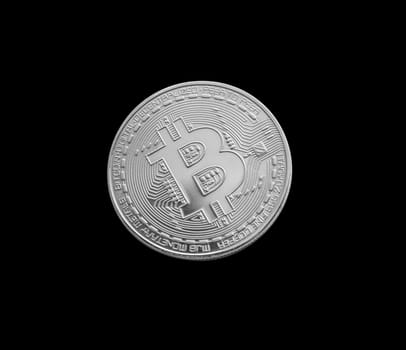 Bitcoin. Silver bitcoin isolated on black background. With clipping path.