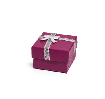 Purple gift box with silver ribbon isolated on white background