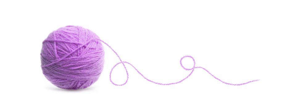 Pink ball of Threads wool yarn isolated on white background