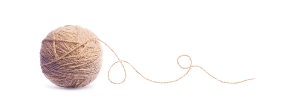 Brown ball of Threads wool yarn isolated on white background