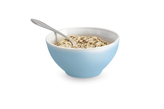 Food. Oatmeal or dry cereal in a blue bowl. Isolated on white background. With clipping path