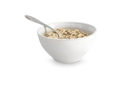 Food. Oatmeal or dry cereal in a white bowl. Isolated on white background. With clipping path
