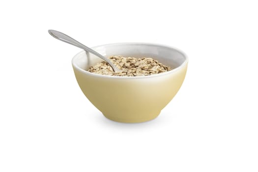 Food. Oatmeal or dry cereal in a yellow bowl. Isolated on white background. With clipping path