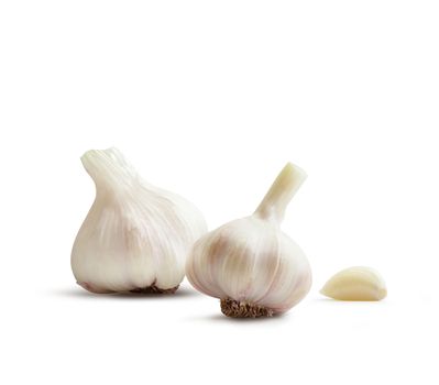 Garlic group and slices. Isolated on white background.