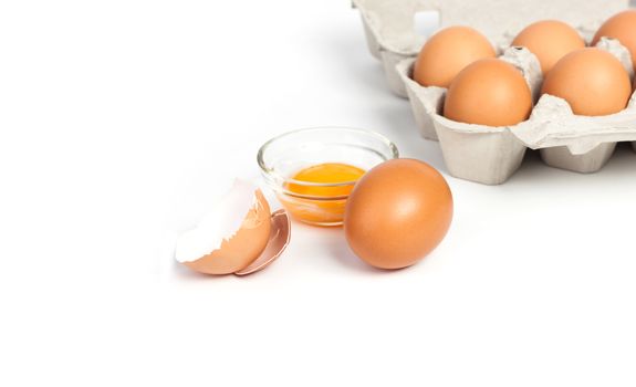Chicken eggs in pulp egg carton isolated on white background