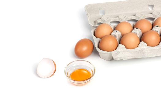 Chicken eggs in pulp egg carton isolated on white background