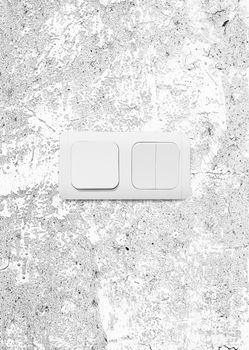 Electric switch of the three buttons on the wall. With clipping path
