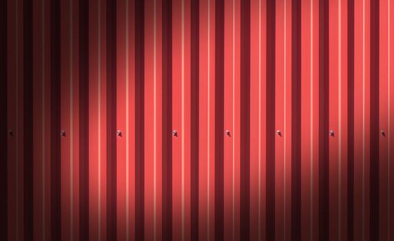 Fence made of metal panels a red color outdoors