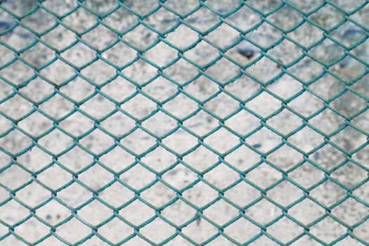 Rusty fence of color metal mesh background