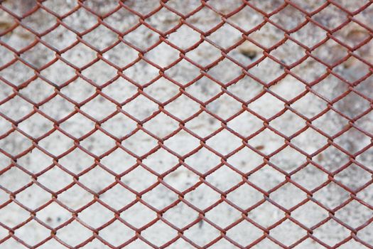 Rusty fence of color metal mesh background