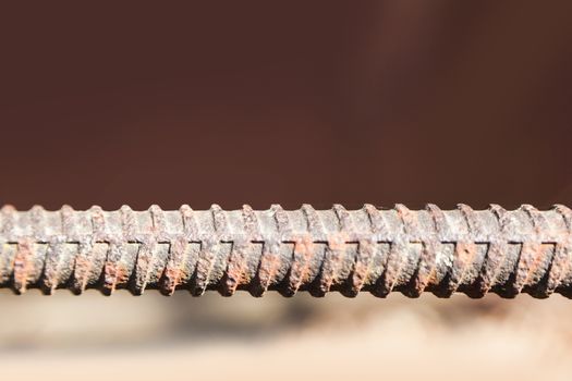 Reinforce steel iron rod. Metal fittings, rebar texture. Closeup macro steel used in construction concrete.