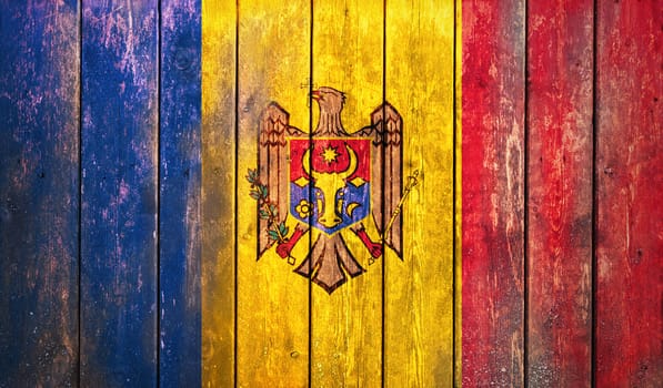 Grunge Moldova Republic flag on a wood surface