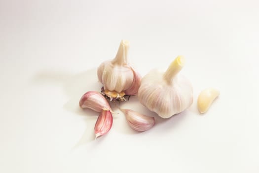 Garlic group and slices. Isolated on white background.