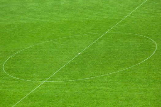 Soccer field center and ball top view background