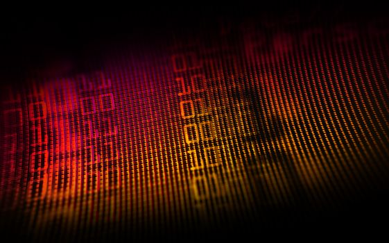 Digital binary data on computer monitor screen. Close-up with small depth resolution