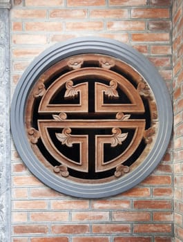 Chinese longevity symbol on a wall in Hanoi, Vietnam