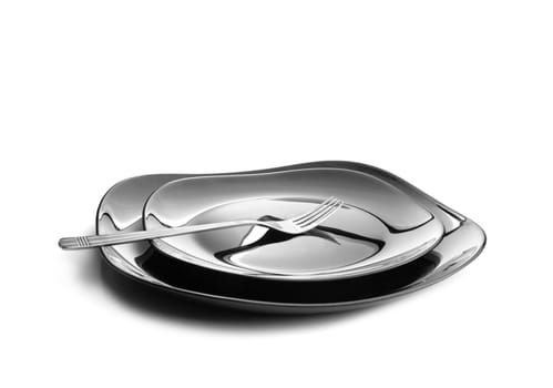Fork at two black plates on white background