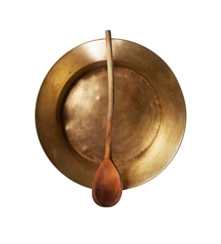 Empty copper tray, wooden spoon on a white background. With clipping path