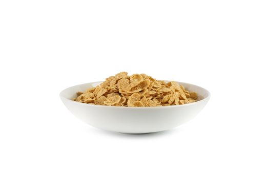 Corn flakes isolated in a plate on white background. With clipping path.