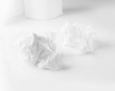 Crumpled paper ball isolated on white background. Bluren concept
