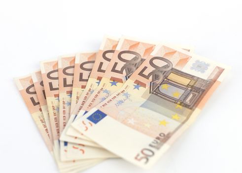 Euro money banknotes isolated on white background. Blurred concept