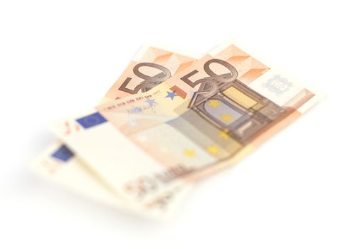 Euro money banknotes isolated on white background. Blurred concept