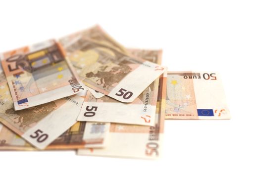 Euro money banknotes isolated on white background. Blurred concept